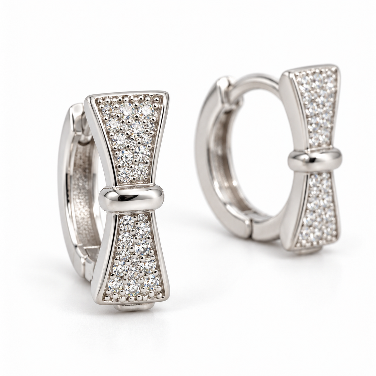 Silver Bow Huggie Earrings