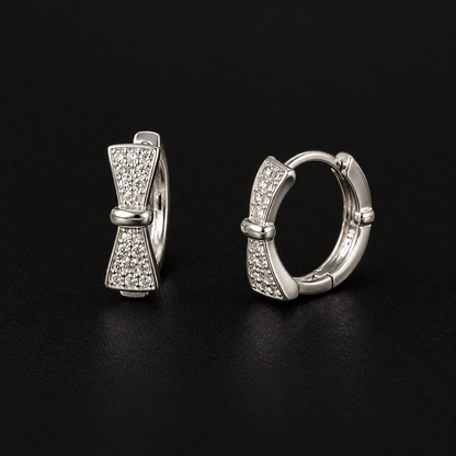 Silver Bow Huggie Earrings