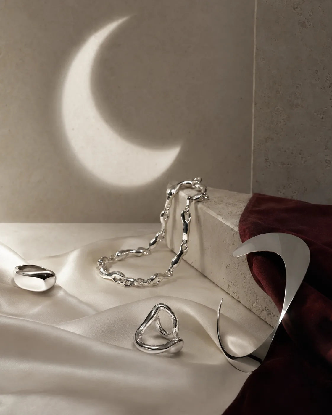 VZYRA sterling silver jewellery styled on ivory silk